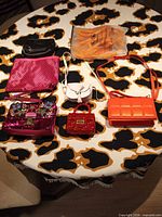 Group shot of all seven bags and pouches displayed on table