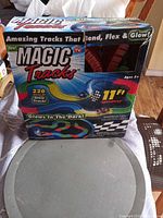 Front of Magic Tracks box displaying product information
