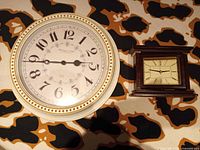 Both clocks side by side showing overall size and design
