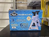 Front of Mack Hydraulics box showing capacity and range