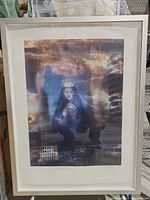 full view of framed print in white frame