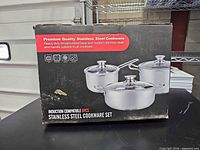 Front of box showing cookware set image and features