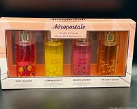 Front view of boxed Aéropostale Fruity & Floral Body Mist Collection showing four bottles