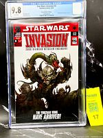 Front view of CGC-slabbed comic showing grade 9.8, cover art, MaxSold tag
