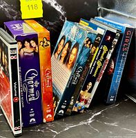 All seven TV series box sets standing side by side showing spines and general condition