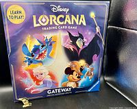 Front of Disney Lorcana Gateway box with Learn to Play badge and included Mickey enamel pin