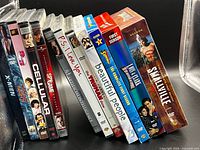 Front view of all DVD spines showing titles and quantity