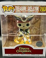 Front view of boxed Funko Pop showing figure and Disney Parks exclusive sticker