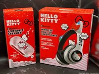 Front view of both boxed items: Bluetooth portable speaker and wireless light-up headphones