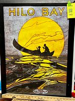 Full view of framed poster showing design and frame