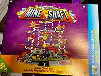Front of original Mine Shaft box showing completed marble run image and instructions strip