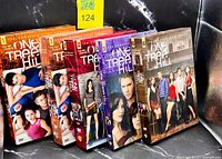 Front view of all four One Tree Hill DVD box sets Seasons 1,2,5,6