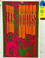 Full view of neon pink, orange and green The Doors poster
