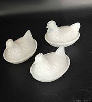 Three milk glass chicken salt cellars lids on bases