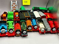 Group shot of all engines, cars and track pieces
