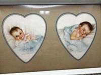 Close-up of both heart-shaped prints within frame