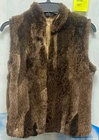 Front view of brown fur-style vest