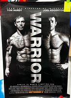 Full view of Warrior poster showing both actors and title