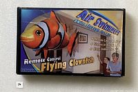 Front of sealed box showing product image and features