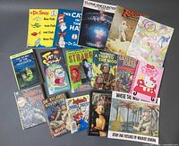 All 15 books laid out