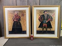 Full view of both framed portraits with size reference