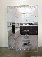 Two boxes of LifeProof rigid core vinyl tile flooring standing upright