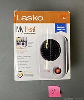 Retail box front displaying Lasko My Heat Personal Heater model and specs