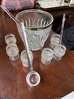 Front view showing bowl, six glasses, ladle, stir sticks