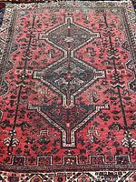 Full view of Shiraz rug showing complete design and size
