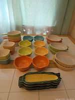 All 15 ceramic pieces grouped together showing colours and forms