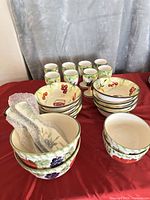 Group view of mugs and stacked bowls