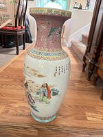 Full view of porcelain floor vase showing overall form and decoration