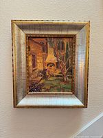 Front view of framed painting on wall