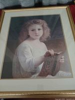 Full view of framed print showing image and frame