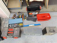 Overall lot with toolboxes, organizers, level and loose tools