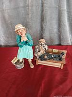 Both clown figurines together for scale and completeness