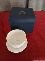 shade resting on base with Sorelle box