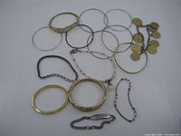 Group shot of all fifteen bracelets and bangles