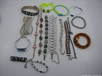Overview of all 17 assorted bracelets laid out