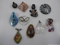 All ten glass pendants laid out for overview