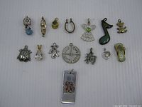 Full overhead view of all 15 pendants laid out