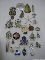 Overall view showing all 25 pendants arranged in grid