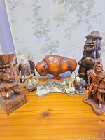 Group shot of all six figurines on tabletop