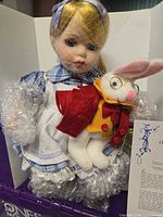 Doll with rabbit accessory in box