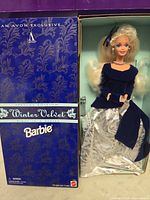 Front of boxed Winter Velvet Barbie showing doll and attire