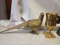 Brass pheasant and one brass goblet