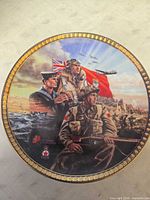 Front view of commemorative plate showing full artwork and gold rim
