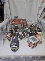 Group of all eight ceramic village pieces