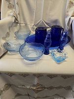 All eight glass pieces displayed together