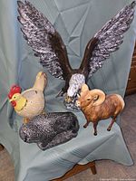 Group shot of all four resin animal pieces